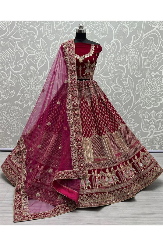 Appealing Embroidered Work On Bridal Velvet Lehenga In Pink Color